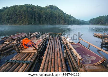 bamboo rafts floating in nice lake