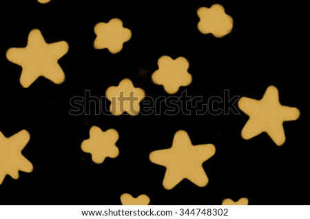 Stars in luxurious glittering background / Abstract background / Festive and holiday theme, success and promotion background