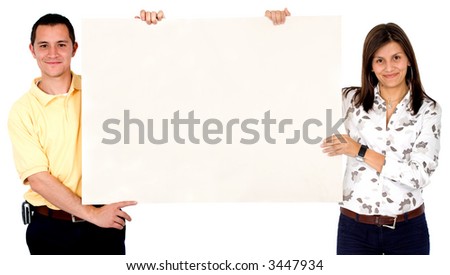 man and woman smiling and holding a banner add - isolated over a white background