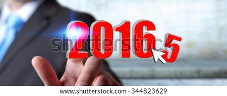 Man holding 2016 icons for the new year