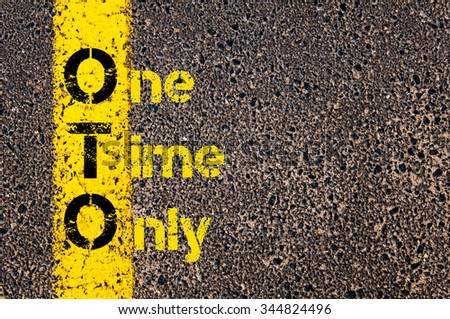 Concept image of Accounting Business Acronym OTO One Time Only written over road marking yellow paint line.