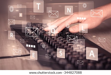 Hand typing on keyboard with digital tech icons and symbols