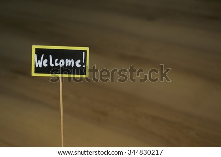 A small blackboard - Welcome! Welcome sign. 