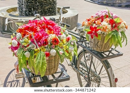 Beautiful Flower basket on vintage bicycle. - classic bike