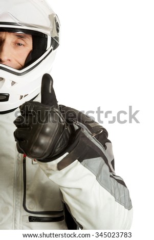 Mature race driver showing ok sign