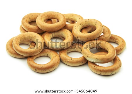 Tasty bagels on white background