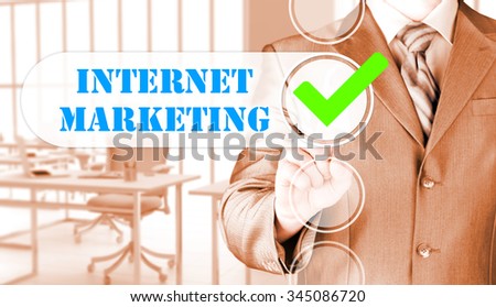 business man pressing checkbox  internet marketing