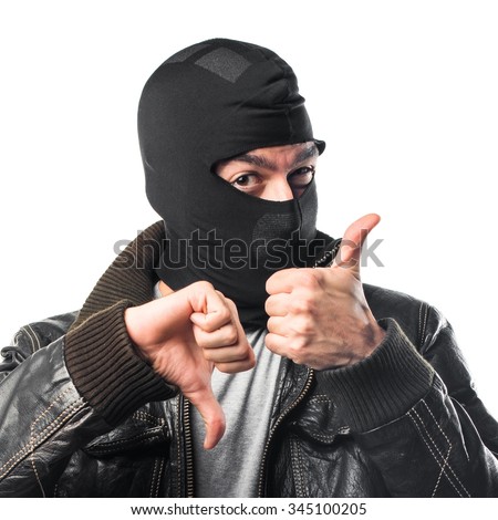 Robber making good-bad sign