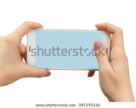 Woman hand holding the white smartphone. Isolated on white background
