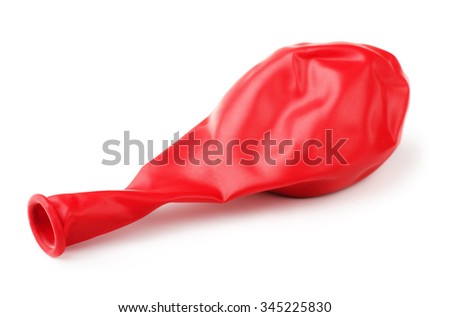 Deflated red rubber balloon isolated on white background Royalty-Free Stock Photo #345225830