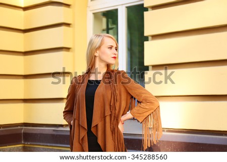Elegant lady in the street of old city