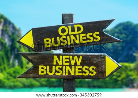 Old Business - New Business signpost in a beach background