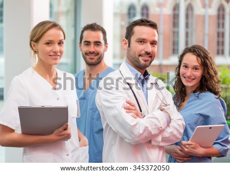 View of a Medical team working at the hospital all together