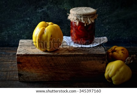 ripe fruit quince on a wooden box, jam.Rustic style.