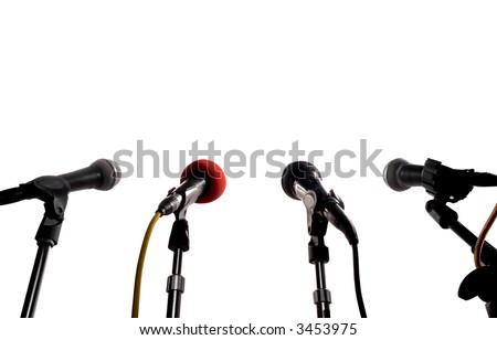 Press Conference (Row Of Microphones Waiting For A Speaker)