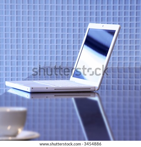 Laptop and tea cup
