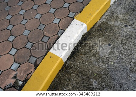 footpath pavement sidewalk with traffic sign