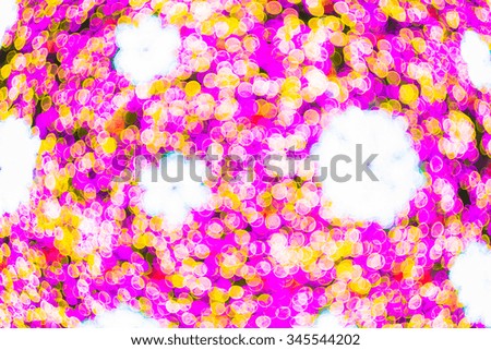 Purple and yellow holiday bokeh. Abstract Christmas background