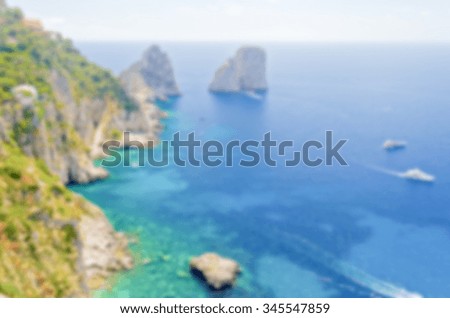 Defocused background of the Faraglioni Rocks, island of Capri, Italy. Intentionally blurred post production for bokeh effect