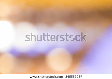 background of blurred yellow and purple lights