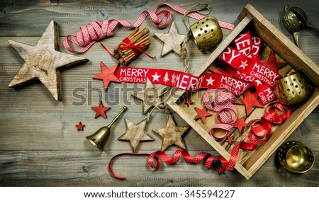 Red and golden christmas ornaments. Vintage style dark toned picture