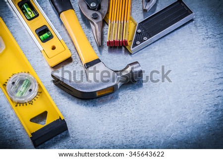 Square ruler construction level hammer pliers steel cutter wooden meter.