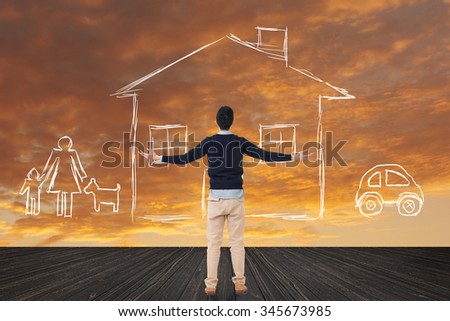 Asian man look toward the drawing house and family in the heaven.