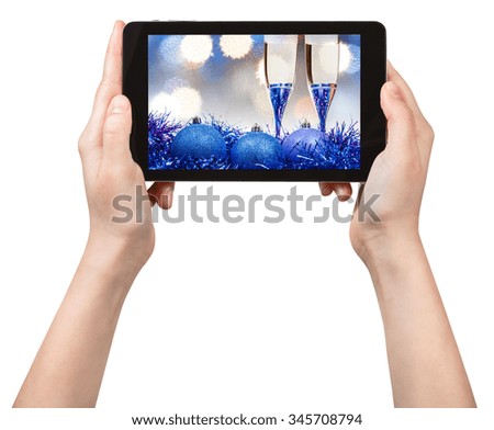 take picture of blue Christmas still life with tablet pc isolated on white background