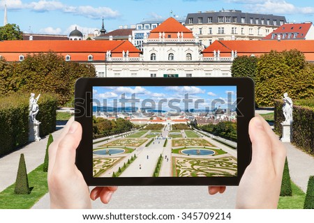 travel concept - tourist snapshot of garden and Lower Belvedere Palace in Vienna on tablet pc