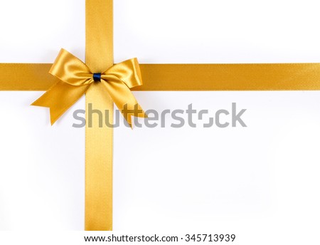 Gold ribbon with gold ribbon bow isolated on white