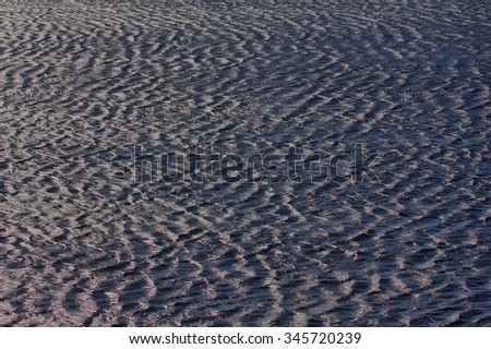 sea surface covered with regular wave crests, forming harmonious picture, Arctic ocean