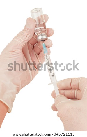 vaccine in hand on white background