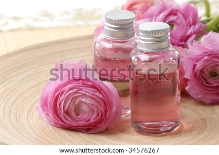   Perfume bottles with flower rose