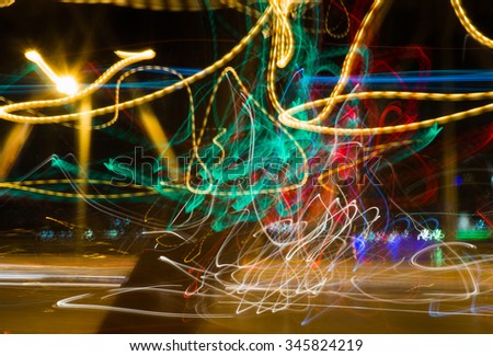 Magic abstract light trails in random motion - abstract background image