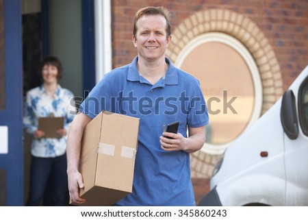 Courier Making Delivery To Client Office