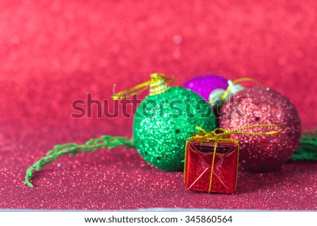 Holiday Christmas ball background with gift boxes