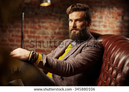bearded man with a very interesting look Royalty-Free Stock Photo #345880106