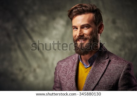 bearded man with a very interesting look Royalty-Free Stock Photo #345880130