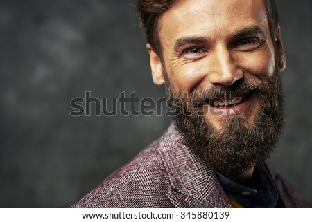 bearded man with a very interesting look Royalty-Free Stock Photo #345880139