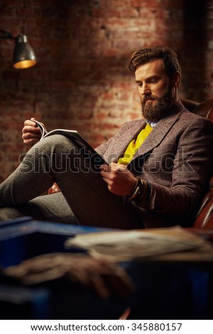 bearded man with a very interesting look Royalty-Free Stock Photo #345880157