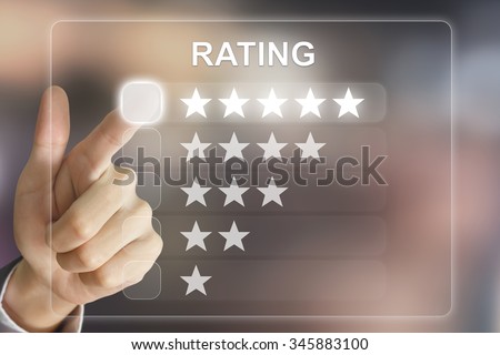 business hand clicking rating on virtual screen interface