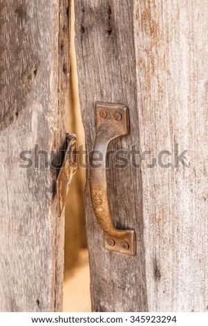 the door handle wooden old