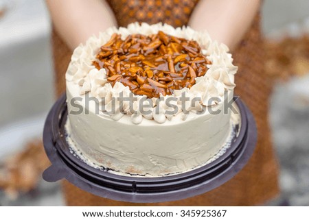 coffee cake with almond nut and butter cream