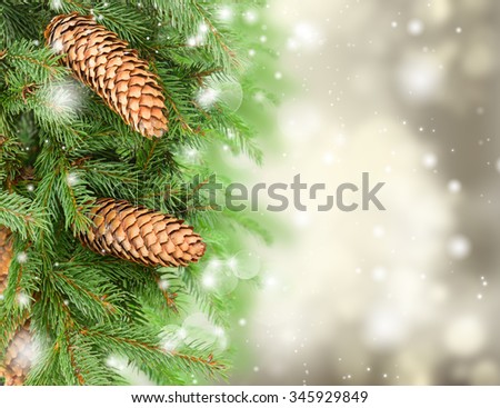 christmas tree and pine cones on gray festive background 
