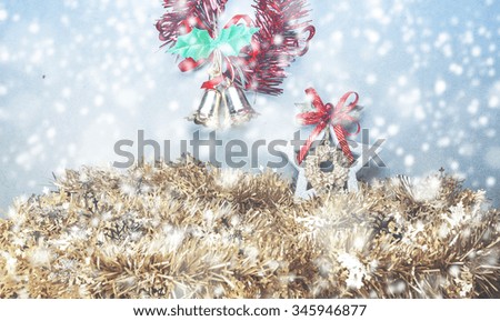 Christmas gift decorations and snowflake on abstract blur background.