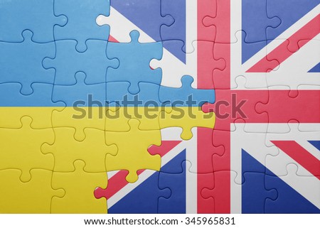 puzzle with the national flag of great britain and ukraine . concept