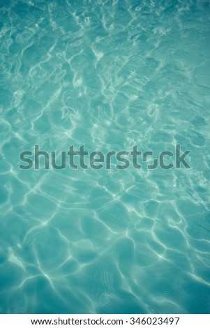 light blue water  texture pattern in swimming pool background