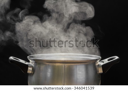 steam over cooking pot Royalty-Free Stock Photo #346041539