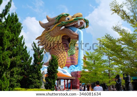Large golden dragon statue Chinese style at Dragon descendants museum, Suphanburi, Thailand