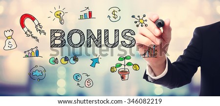 Businessman drawing Bonus concept on blurred abstract background 